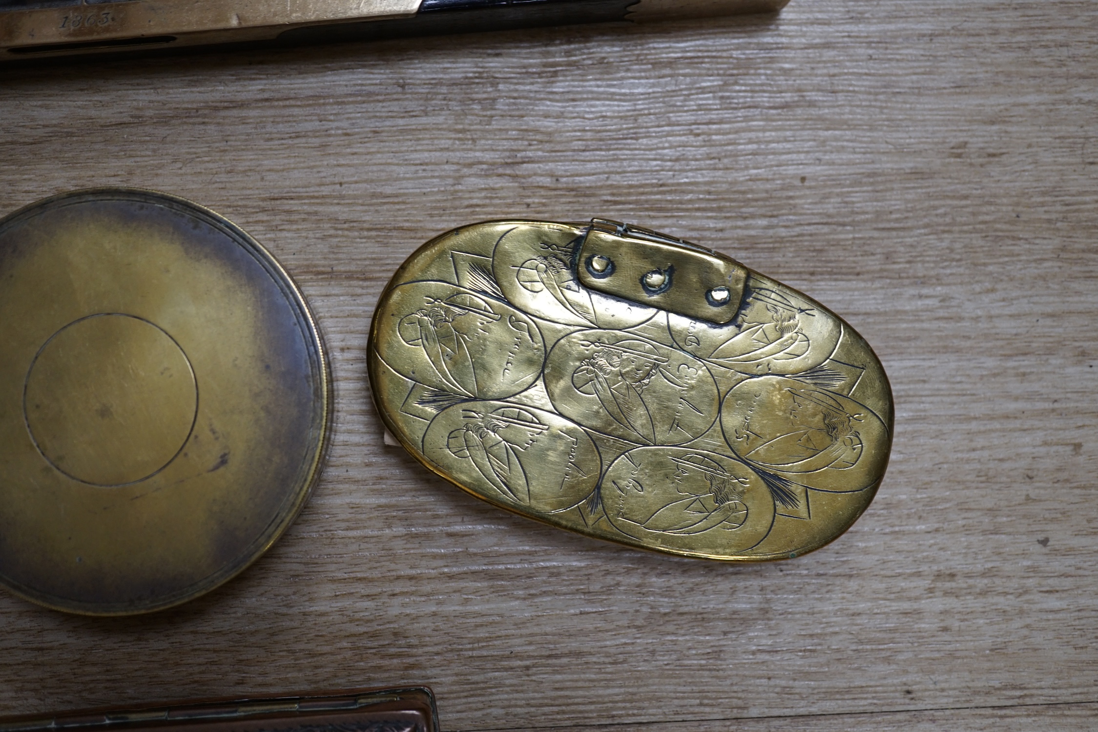 Two portable sundials, two brass inlaid spirit levels and a wood compass, wooden compass 34cm long. Condition - fair to good